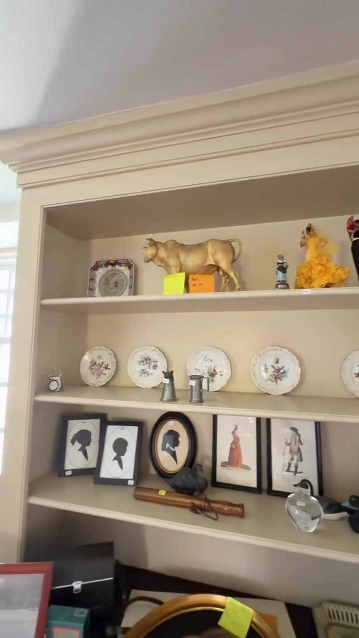 Antique china and portraits displayed at the Cannery Road estate.